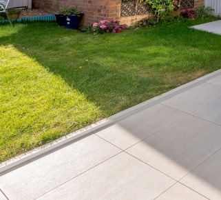 Threshold Between Tiles and Lawn