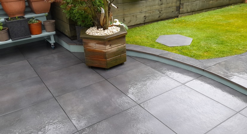 Outdoor porcelain tiles wet from rain