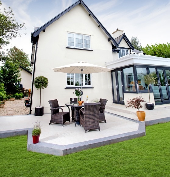Light cream patio with dark border tiles