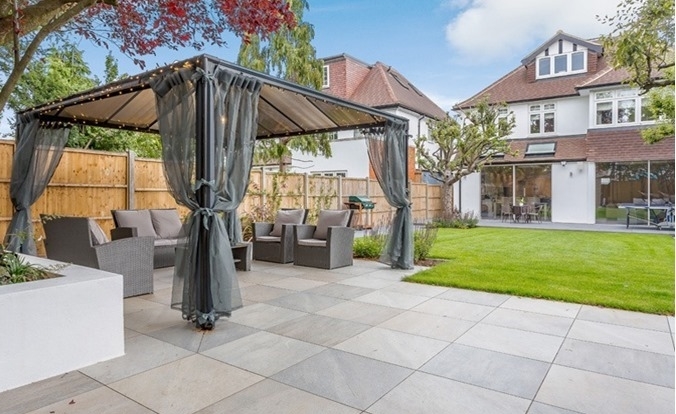 20mm Quartz Twilight Paving in sunny garden patio