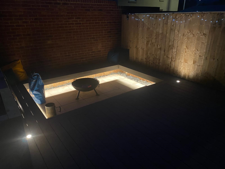 Deck with firepit on porcelain paving