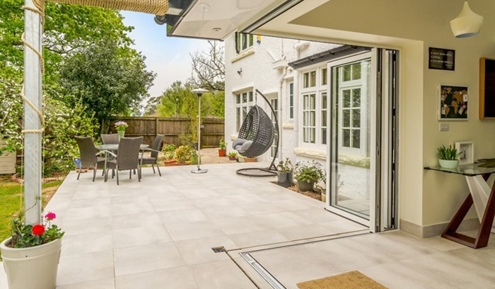 beautiful outdoor porcelain paving patio - does a patio add value to your home?