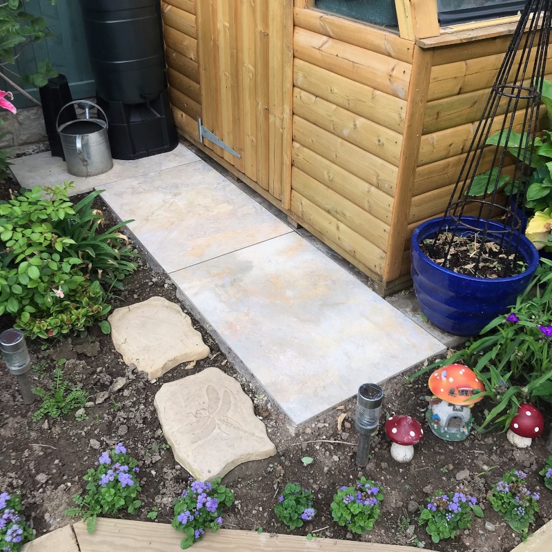 Paving slabs outside garden shed